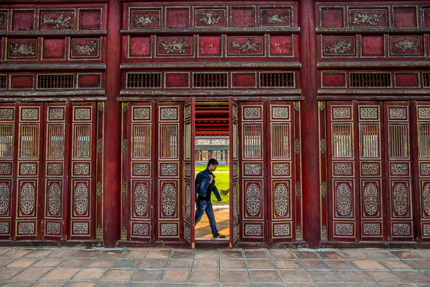 A man walks through the Royal Citadel in Hue.