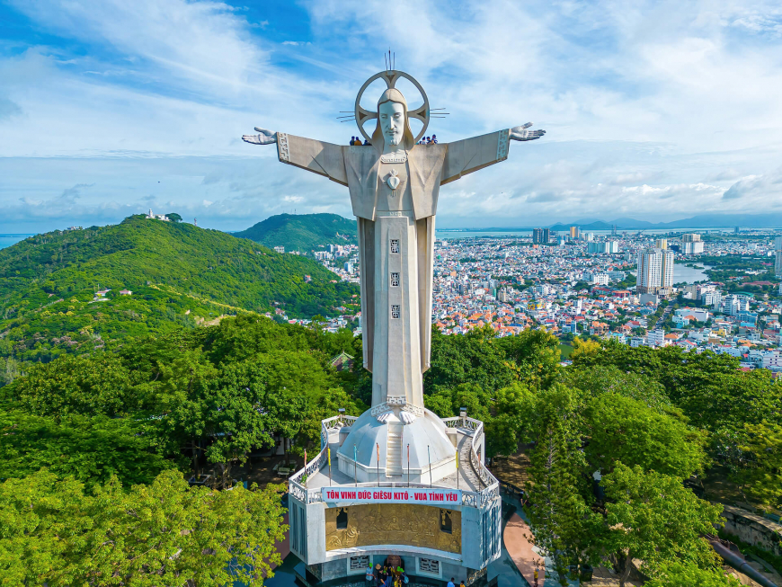 Vung Tau with statue of Jesus Christ on Mountain