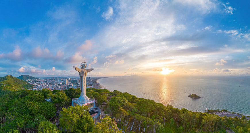 Jesus Christ statue on the hill oversee the sea